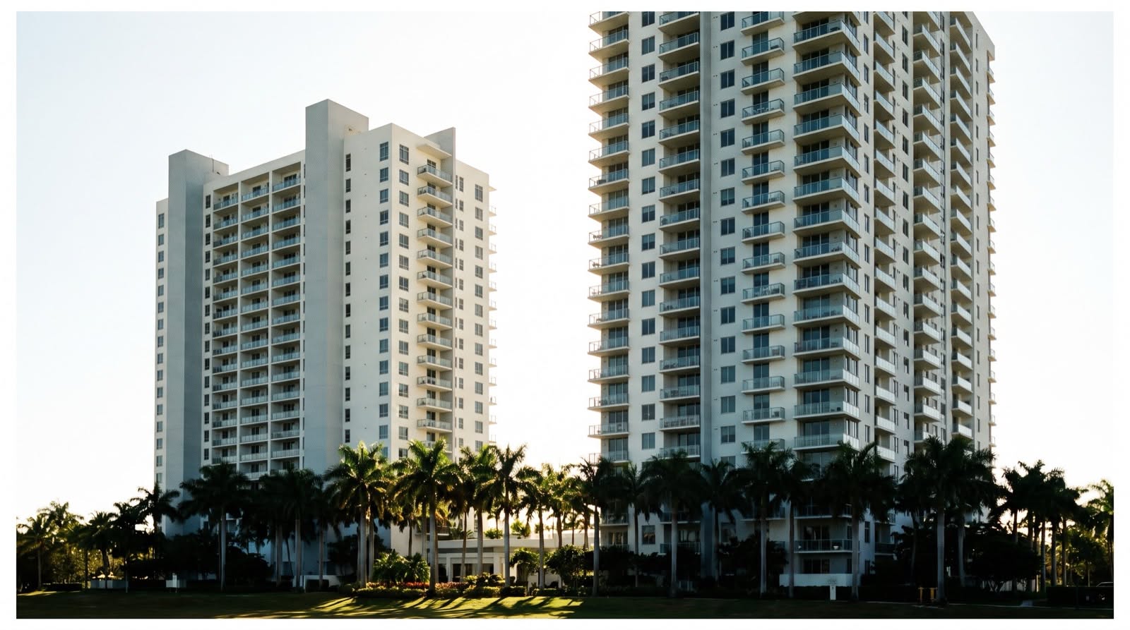 Two residential condominium towers standing side by side